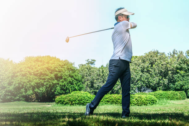 istock male golfer swinging 1094745578
