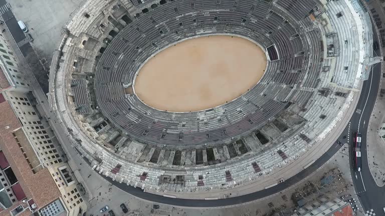 Flying over the old Roman amphitheatre in the city of Nimes