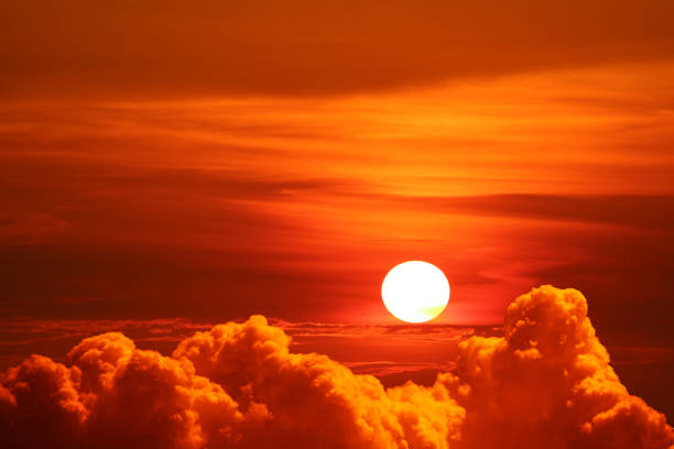 istock sunset back on silhouette colorful heap cloud red sky 1094751686
