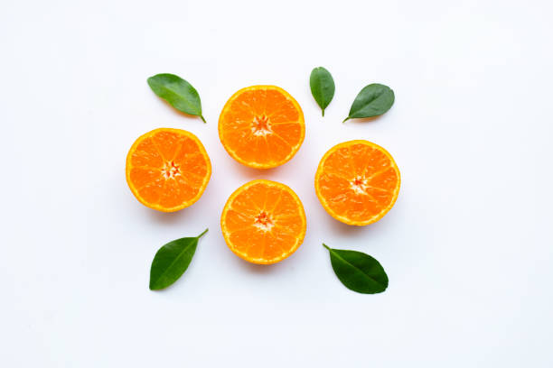 istock Orange fruits with  leaves on white background. 1094757290