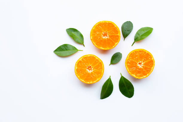 istock Orange fruits with  leaves on white background. 1094757296