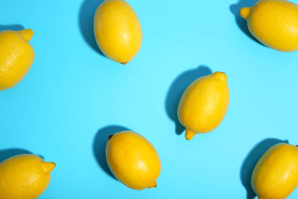 istock Fresh lemon on blue background. Tropical fruit. 1094759228