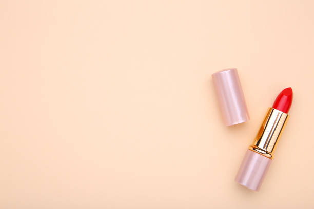 istock Red lipstick on beige background, make up 1094760712