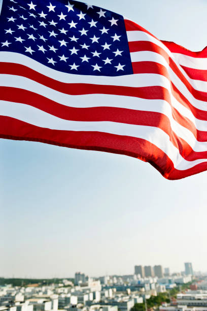 istock Waving American flag and building 1094760776