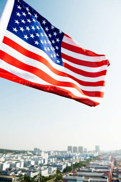 istock Waving American flag and building 1094760778