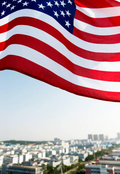 istock Waving American flag and building 1094760780