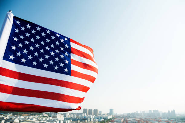 istock Waving American flag and building 1094760804