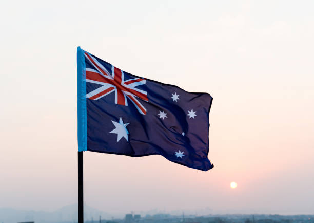istock Australia national flag at sunset 1094760992