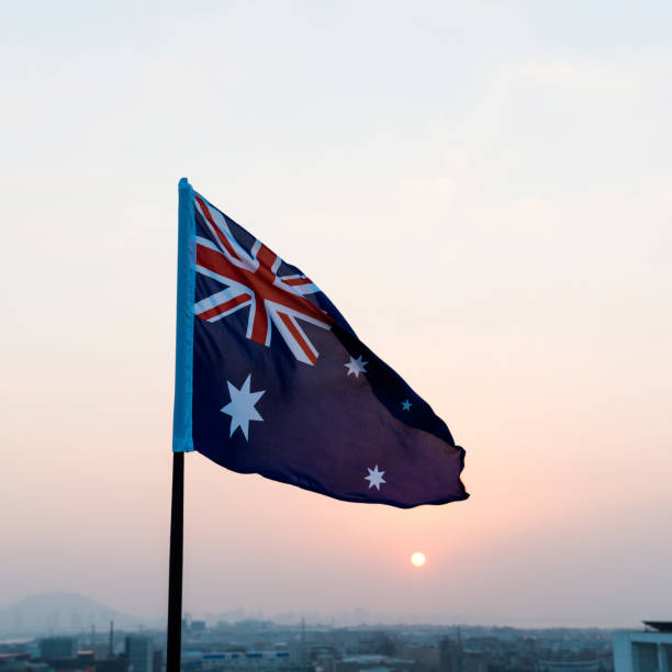 istock Australia national flag at sunset 1094761020