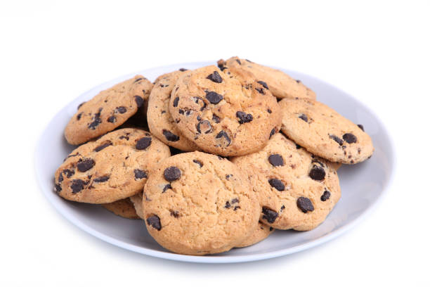 istock Chocolate chip cookies on plate isolated on white 1094763862