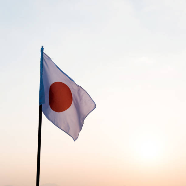 istock Flag of Japan waving in the wind 1094764220