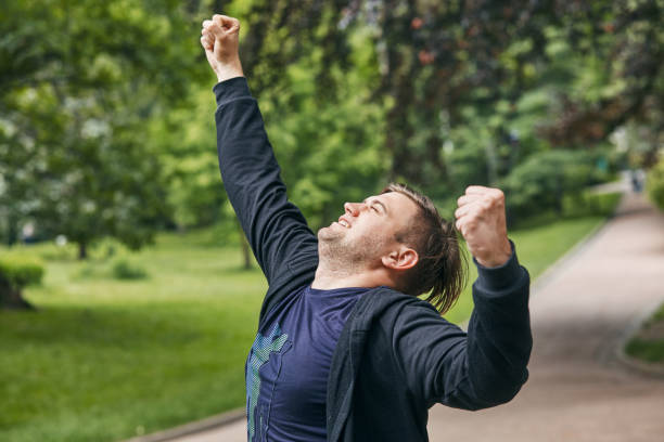 istock a young man in anticipation of victory 1094765580