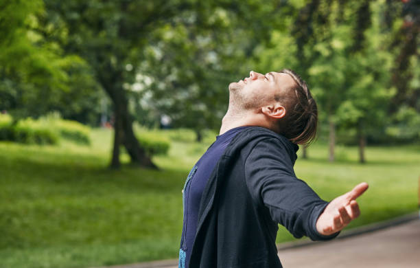istock a young man feels relaxed and free 1094765586
