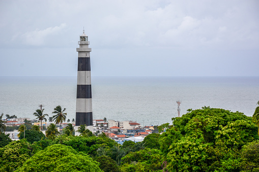 Aerial view of Olinda Lighthouse and Church of Our Lady of Grace, Catholic Church built in 1551, surounded by palms, Olinda, Pernambuco, Brazil