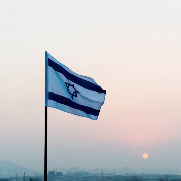 istock Israel's national flag in the wind 1094766132