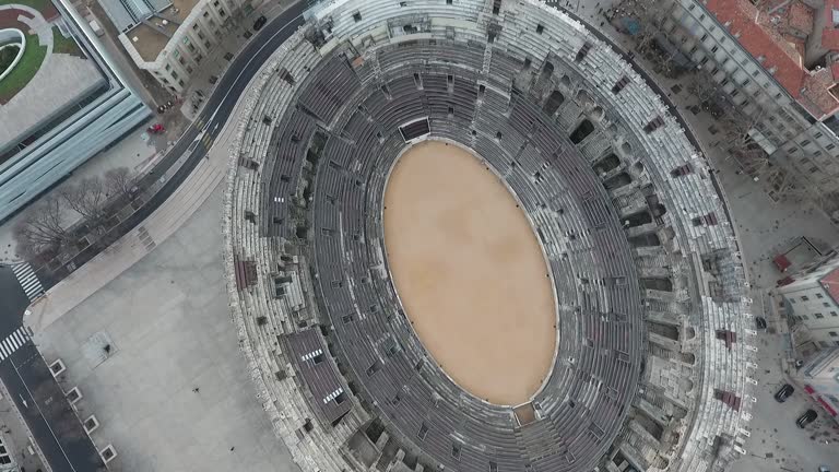 Flying over the old Roman amphitheatre in the city of Nimes