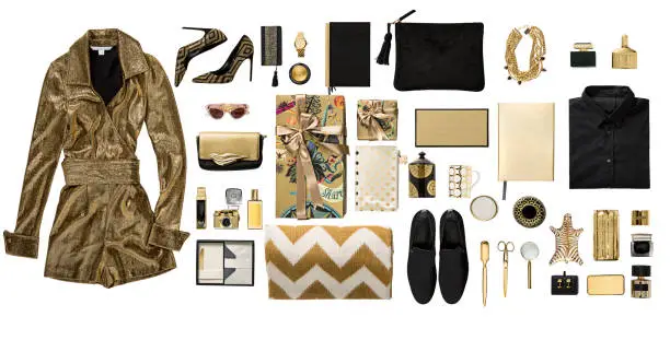 Photo of Luxury fashionable gold clothing and stationery items flat lay on white background
