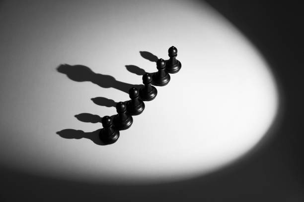 istock Chess pawns standing in a row 1094776466