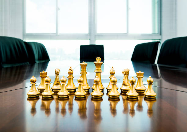 istock Golden pieces on the conference table 1094781234