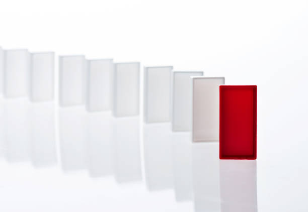 istock The red domino stands out 1094782460