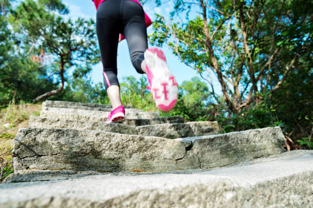 istock Woman feet walking on the steps 1094784974