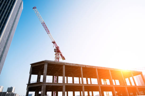 istock The crane working between the two buildings 1094787500