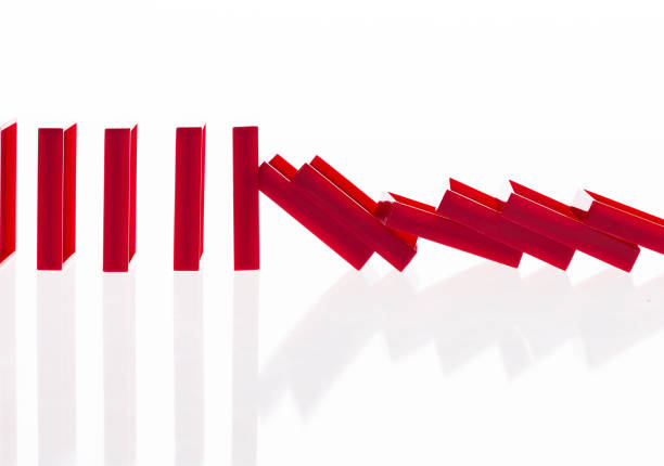 istock A row of red dominos falling down 1094789514