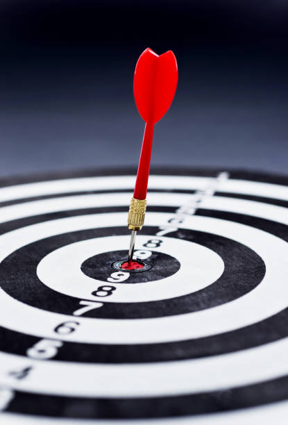 istock Hitting the bulls eye on the black background 1094789678