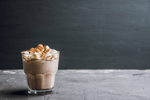 istock Hot Chocolate drink with marshmallow and cinnamon in old-fashioned glass 1094794306