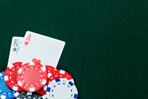 istock Ace and king with poker chips 1094795610