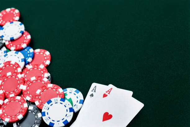 istock A pair of aces and poker chips on card table 1094796988