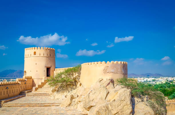 istock Old fort, an oasis and blue sky. 1094797232