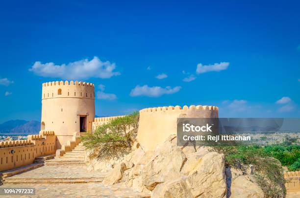 Old Fort An Oasis And Blue Sky Stock Photo - Download Image Now - Oman, Building Exterior, Muscat - Oman