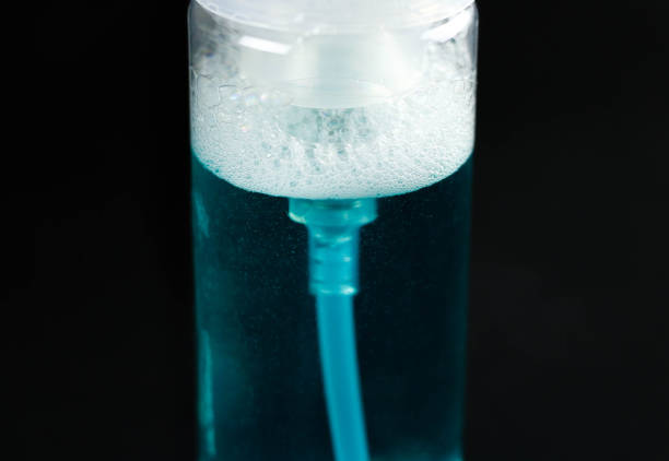 istock Blue makeup remover. Close up. Isolated on black background 1094801032