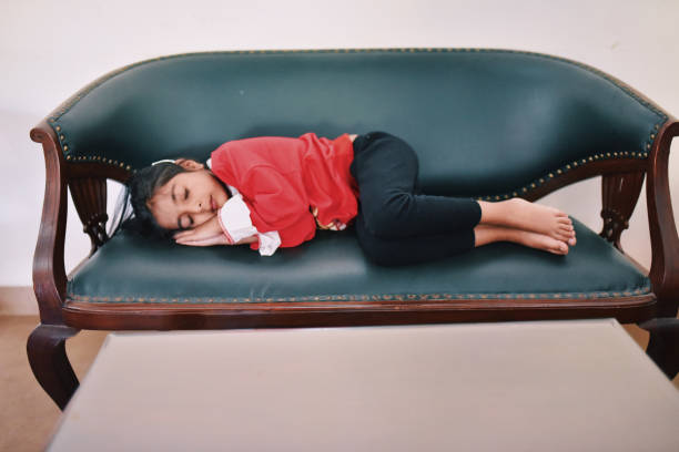 istock Preschool girl sleeping on the sofa 1094801200