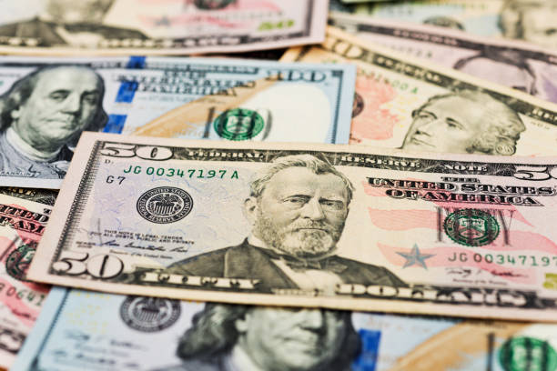 istock Group of dollar bills background 1094806646
