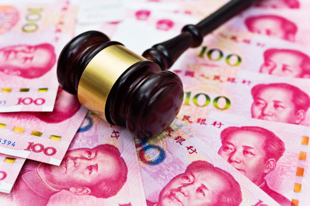 istock Group of Chinese yuan note and gavel 1094807142