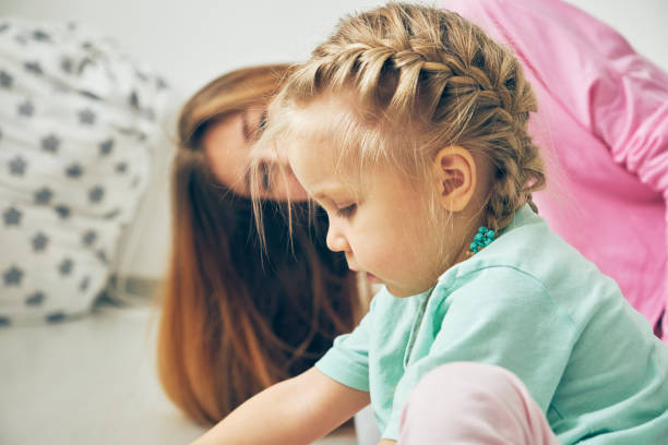 istock Mother and daughter playing 1094807156