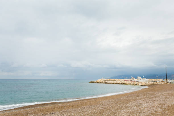 Beautiful Latsi fisherman's village on Cyprus island. Landscape taken during cloudy weather.