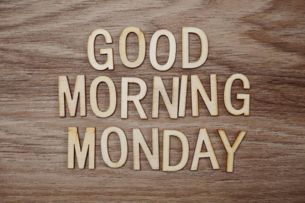 istock Good Morning Monday text message on wooden background 1094809750