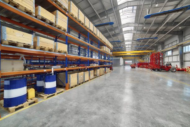istock Factory assembly shop. High storage racks with wooden boxes 1094817706