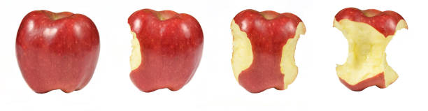 istock Process of eating red apple isolated on white background. Snacked apples. Collage on white background 1094823278