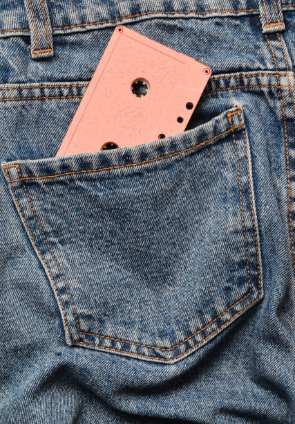 istock Audio cassette in the back pocket of rumpled jeans 1094825992
