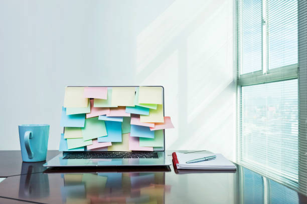 istock Laptop and office supplies on table 1094827036