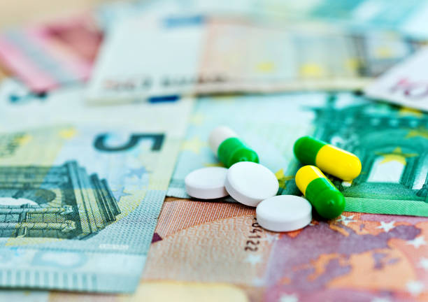 some pills on european union currency - european union euro note european union currency paper currency currency imagens e fotografias de stock