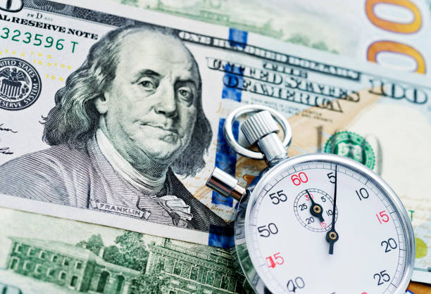 istock Stopwatch on the US dollars 1094829822