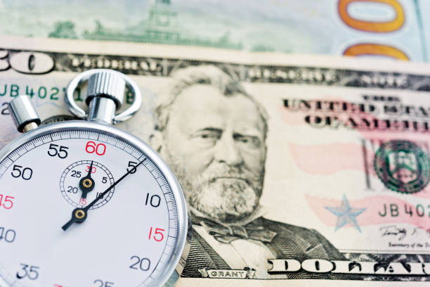 istock Stopwatch on the US dollars 1094829824