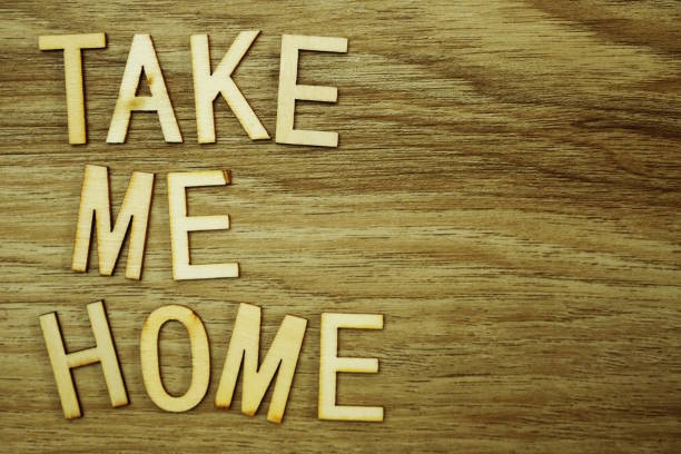 istock Take Me Home text message on wooden background 1094830108