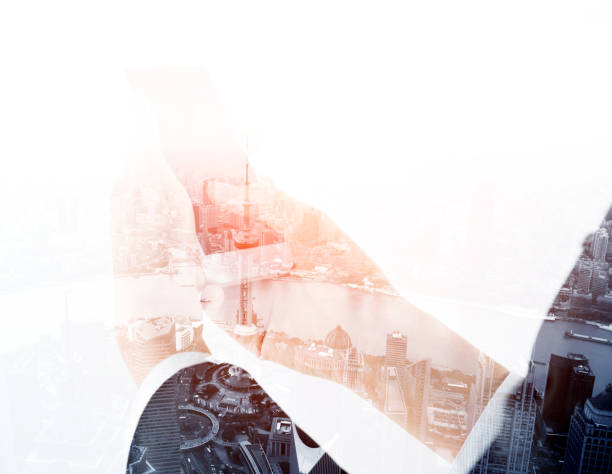 istock Multiple exposure of businesswoman hands using mobile phone 1094833240