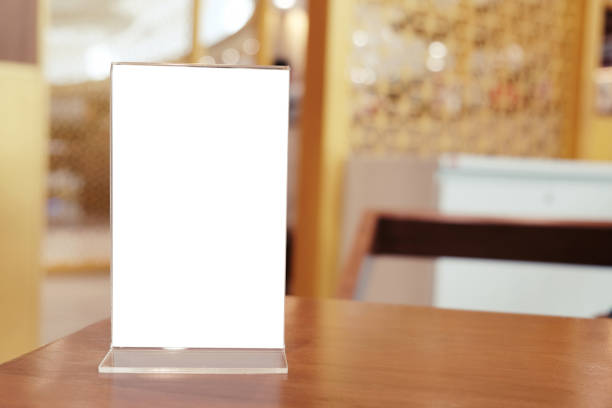 istock Menu frame standing on wood table in Bar restaurant cafe. space for text marketing promotion. 1094835248